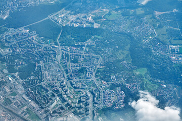Panoramic aerial photography of flat terrain with infrastructure from a bird's eye view.
