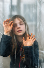 Locked up at home behind a dirty oilcloth, a frightened teenage girl, a kidnapped child, asks for...