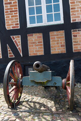 Ebeltoft / Denmark: Old field gun in front of the historic town hall