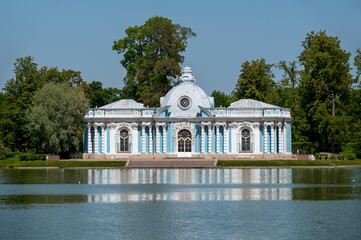 Grotto pavilion in Catherine Park on a sunny summer day. Tsarskoye Selo (Pushkin), Russia - 784724537