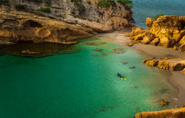 Diver at Illot Beach L'Ametlla de Mar, Tarragona, Spain