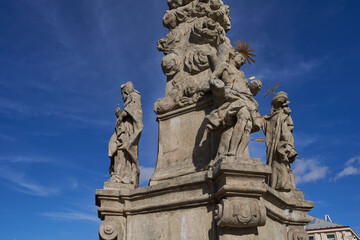 Caslav, Czech Republic - February 24, 2024 - the Marian Plague Column on the Zizka Square on a sunny winter day