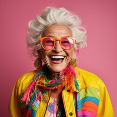 Stylish older woman in rainbow jacket and sunglasses