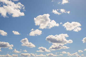 Sky. The clouds. Fluffy clouds in a blue sky. Landscape