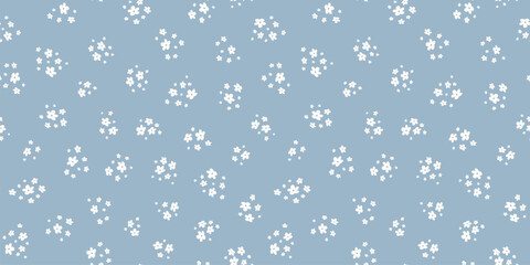 Subtle ditsy pattern. Simple vector blue and white seamless ornament with small flowers. Elegant abstract floral background. Minimalist texture. Repeated design for decor, fabric, wallpaper, print - 784741373