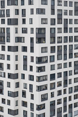 New apartment buildings with windows and balconies. Modern european complex of apartment buildings. And outdoor facilities. Mixed media