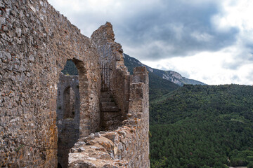 Cathar castle at the top of a mountain in the south of France - 784748932