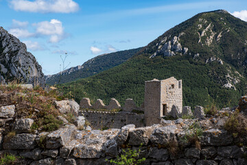 Cathar castle at the top of a mountain in the south of France - 784748949