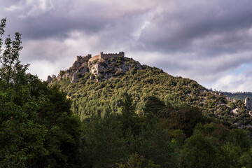 Cathar castle at the top of a mountain in the south of France - 784748951