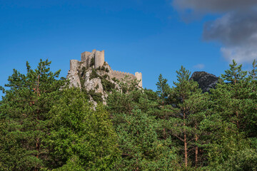 Cathar castle at the top of a mountain in the south of France - 784748957