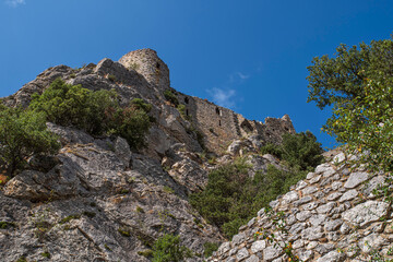 Cathar castle at the top of a mountain in the south of France - 784748969