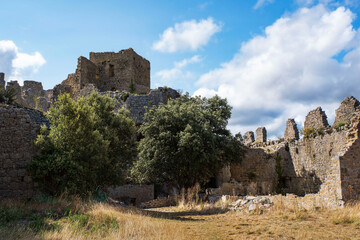 Cathar castle at the top of a mountain in the south of France - 784748972