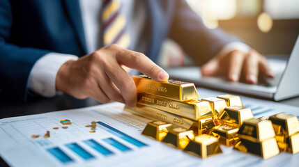 Businessman with gold bars and financial analysis. Perfect for banking, investment, and wealth management themes.