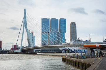 Foto op Aluminium Rotterdam, Netherlands - April 9, 2024: View of the Erasmus Bridge which connects the north and south parts of Rotterdam. © Menyhert