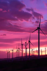Fototapete Rund Eco-Friendly Power Generation: Silhouettes of Wind Turbines Backlit by Stunning Sunset © Antonio