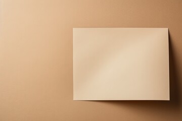 Beige background with dark beige paper on the right side, minimalistic background, copy space concept, top view, flat lay, high resolution photography