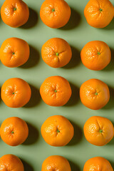tangerines on a olive green background