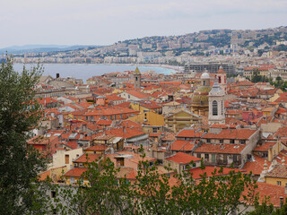 Panorama of Nice from the observation deck. View of the city and the sea, French Riviera. Picturesquee tile roofs
