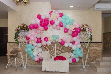 Decoration with balloons and flowers at a christening