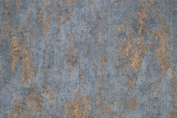 Gray, blue and golden textured wall surface. Rough stylized texture. Abstract decorative background. Old effect background for wallpaper or graphic design.
