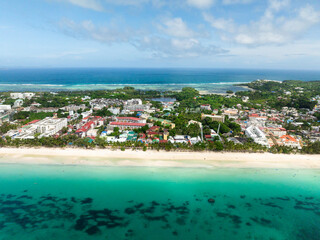 Drone view of Boracay with white sandy beaches, shops and restaurants. Island in Malay, Aklan. Philippines.