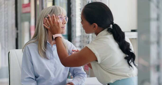 Doctor, patient and help for glasses at store with assistance, support and option for health care. Women, optometrist and eyewear shop with prescription or assessment, consultation and satisfied.