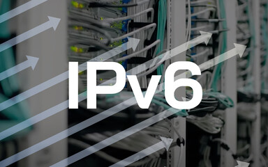IPv6 lettering and rising arrows in front of wires and lights of server in the background,...