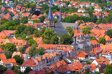 Aerial view of Wernigerode with distinctive red roofs and lush Harz foothills, Germany
