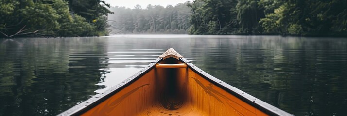 photo of a canoe on the water - - obrazy, fototapety, plakaty