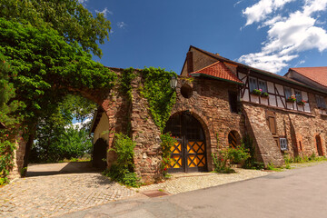 Ancient wall of Wernigerode Castle, picturesque doorway and arch in Wernigerode, Germany