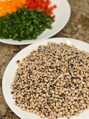 black eye peas and blur cut vegetables background 