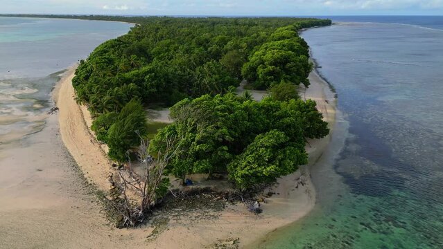 MARSHALL ISLANDS - 3.18.2024 - Excellent aerial pan of the Laura Beach peninsula on the Marshall Islands.