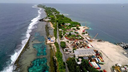 MARSHALL ISLANDS - 3.18.2024 - Excellent aerial footage moving along an industrial port in the Marshall Islands.