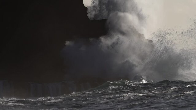 HAWAII - 3.18.2024 - Excellent slow motion view of waves crashing upon Molokai, Hawaii.