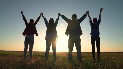 Group of people holding hands raise their hands to sky, prayer of man of woman. Business people,...