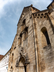Heiligenkreuz, Austria - April 14, 2024: overall view on the details of exterior and interior of the Stift Heiligenkreuz abbey - 784843777