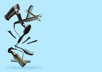 Professional hairdresser tools falling on light blue background, space for text
