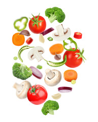 Fresh vegetables and herbs in air on white background