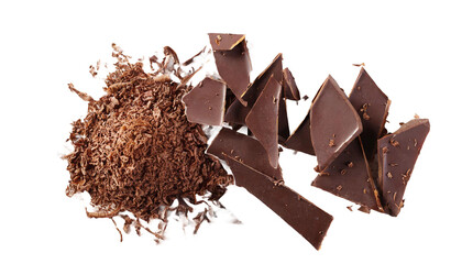 Pile chopped, milled chocolate shavings isolated on transparent, top view - obrazy, fototapety, plakaty