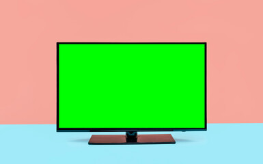 TV 4K flat screen lcd or oled, HD monitor mockup, television with green chroma screen on mint blue...
