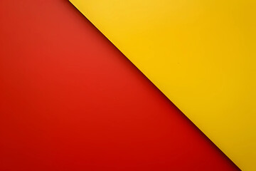 A boldly vibrant background, bisected by a striking diagonal line, divides into two contrasting halves - a luscious deep red on the left and a sumptuously rich yellow on the right