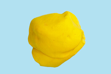 Colorful plasticine clay on blue background.