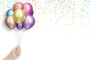 Female hand holds bunch of shiny colorful balloons on yellow background with confetti. Empty space for text