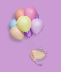 Childrens hand holding colorful matte balloons through the hole in violet paper