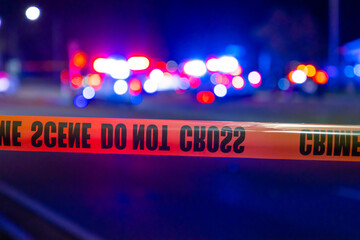 Police lights and crime scene tape