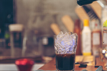Latte art coffee cup with milk on wooden table. Espresso shot make latte art hot coffee cup. Cappuccino with milk in italian coffee shop cafe. Brown hot caffeine beverage in cafeteria with copy space