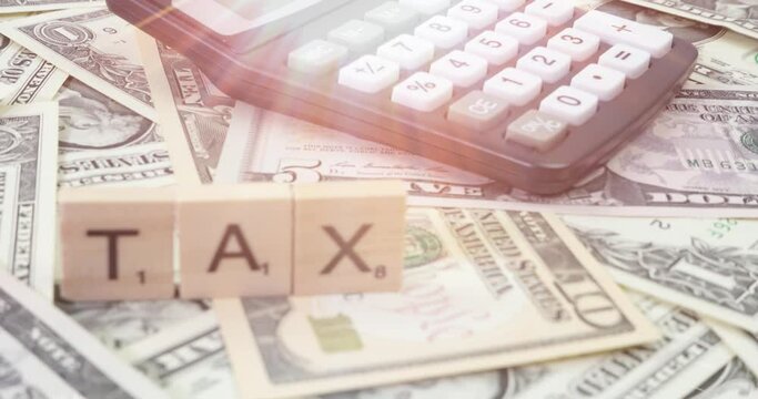 Dollar bills, calculators and taxes in America