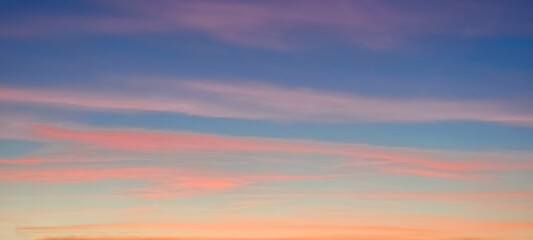 sky colors blue orange lines horizontal in the morniing