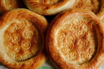 Beautiful flatbreads in close-up. Flatbread is the main type of bread in Central Asia. Delicious,...