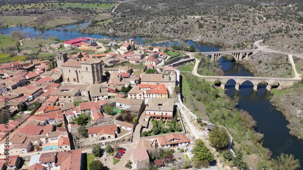 Wall mural Scenic aerial cityscape of Ledesma town and Tormes river at spring, Salamanca region, western Spain